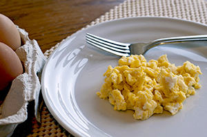 Plate of scrambled eggs.